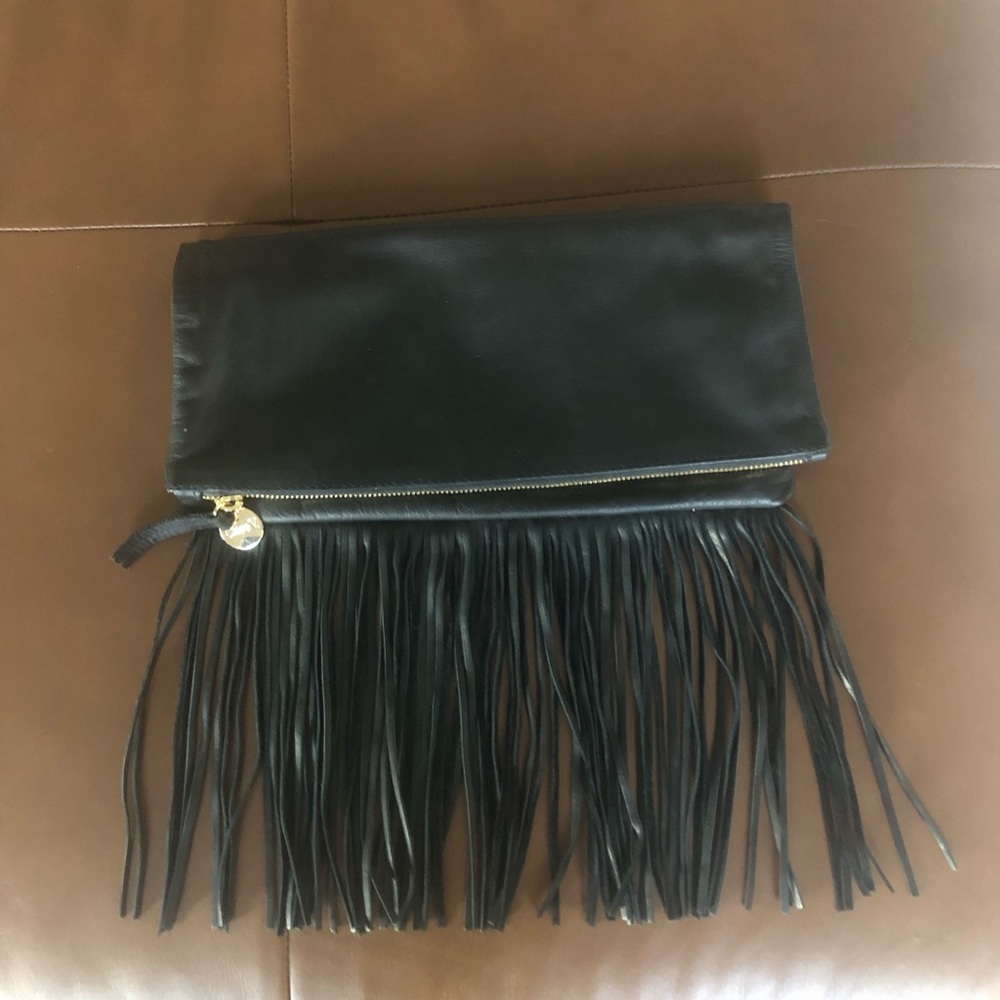 Clare V. Fringe fold over clutch